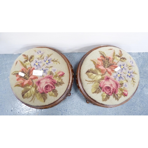 388 - Pair of antique circular footstools with embroidered tapestry tops.  (2)