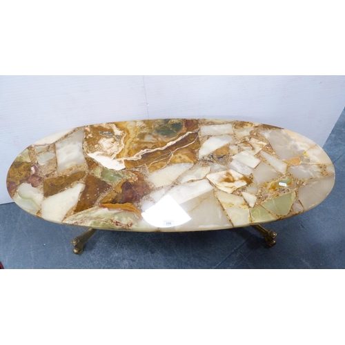 396 - Contemporary onyx-effect oval coffee table on gilt repoussé base.