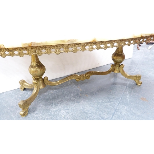 396 - Contemporary onyx-effect oval coffee table on gilt repoussé base.