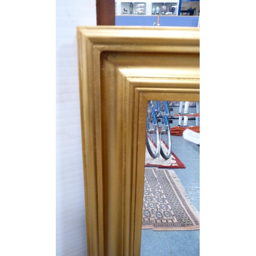 398 - Modern gilt wall mirror, linen box, a modern folding table and a pair of chairs.