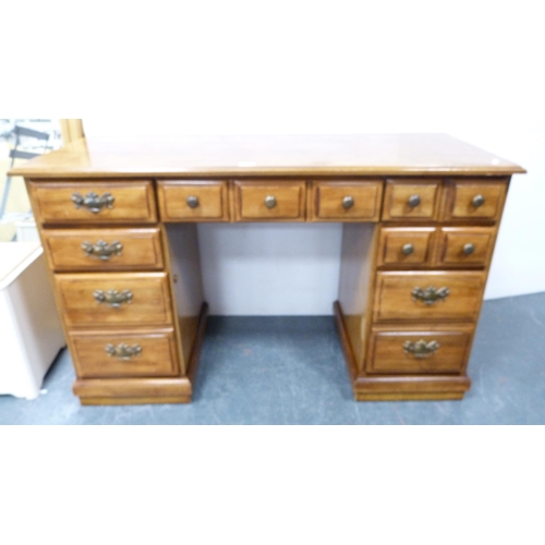 399 - Victorian-style walnut kneehole desk and a similar swivel ladder-back desk chair.  (2)