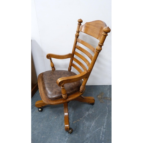 399 - Victorian-style walnut kneehole desk and a similar swivel ladder-back desk chair.  (2)