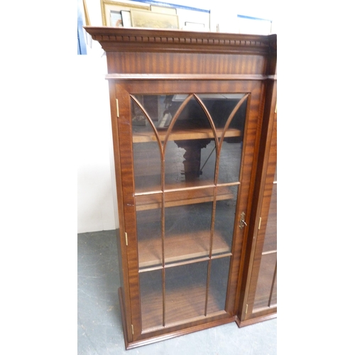 400 - Reproduction Georgian-style mahogany four-door breakfront bookcase on cupboard base.