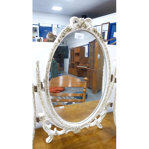 407 - French-style painted tri-plate dressing mirror.