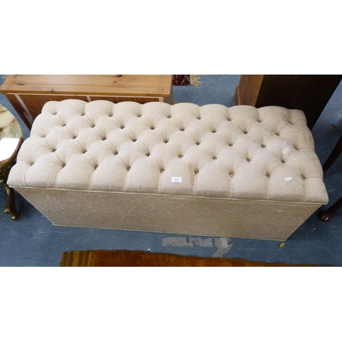 411 - Contemporary upholstered ottoman.