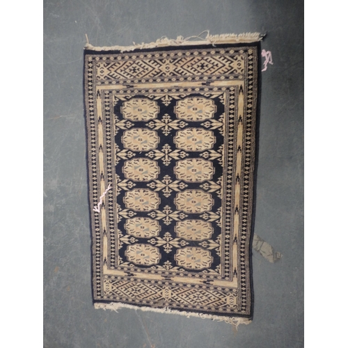 419 - Turkish-style Bokhara rug on blue ground and a smaller example.  (2)