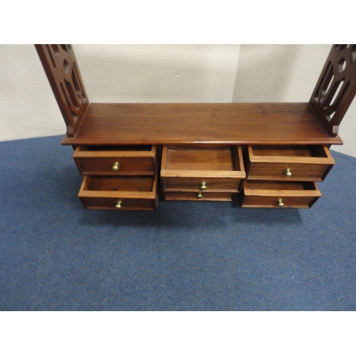 425 - Reproduction Victorian-style mahogany hanging shelves with drawers below.