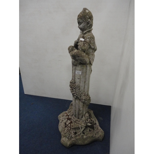 432 - Stone garden figure in the form of a faun seated on a fluted stand.