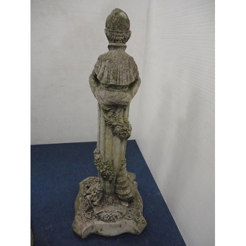 432 - Stone garden figure in the form of a faun seated on a fluted stand.