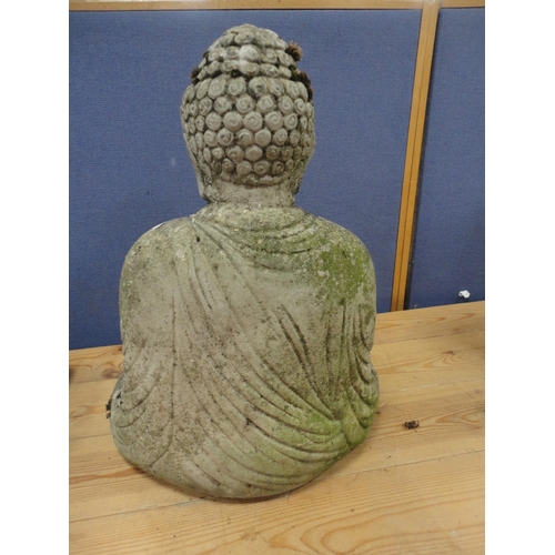 438 - Stone garden figure modelled as an Oriental goddess or Buddha.