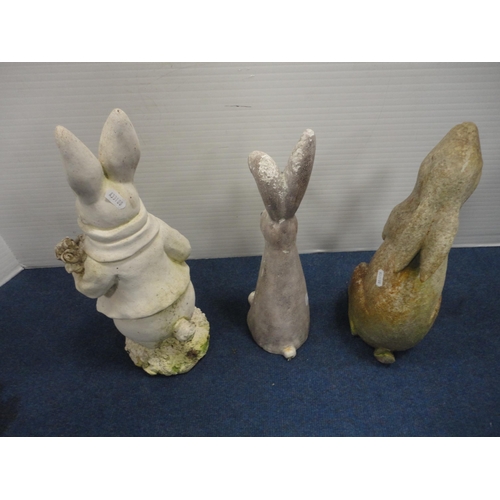 443 - Three composition garden figures in the form of rabbits.  (3)