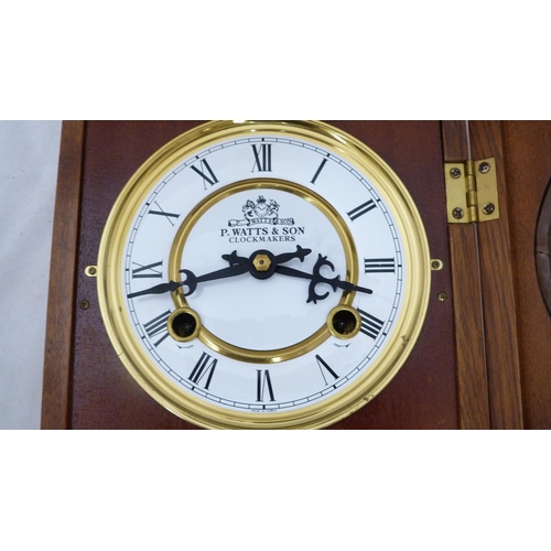 64 - Westminster chime mantel clock with presentation plaque and a wall clock, retailed by P Watson &... 