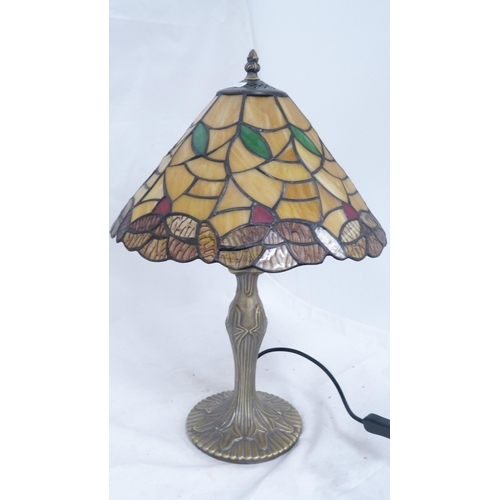 65 - Two Tiffany-style table lamps and shades.