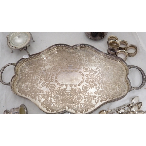 68 - Shaped EP twin-handled tray, water pot, coasters, revolving butter dish, pair of dishes, condiments,... 