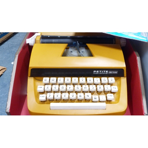 71 - Petite International Deluxe typewriter, porcelain-headed doll, child's wall clock, World Cup 1970 co... 