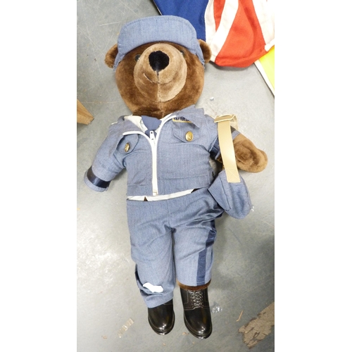 77 - Teddy bear in the form of US mailman with bag, tourist flags, hat stand etc.