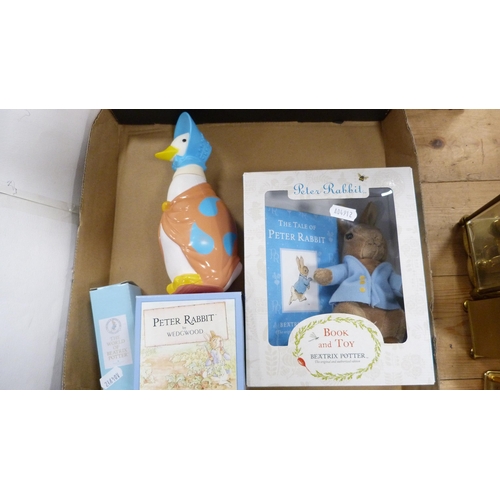 87 - Carton containing Beatrix Potter books, some boxed, and a shallow box containing Beatrix Potter toys... 