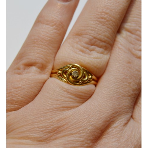 145 - 18ct gold ring of knot style with diamond, Chester 1894, size N, 2.7g gross.