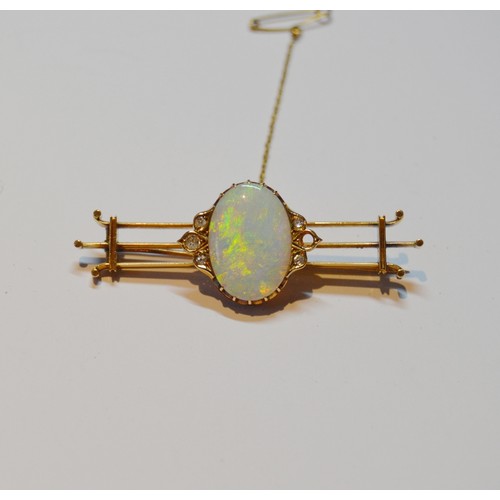 146 - Edwardian gold triple bar brooch with an oval opal and (now) five diamonds, in gold, signed (probabl... 