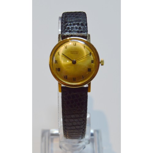 184 - Lady's Vertex Revue 9ct gold watch, on strap.