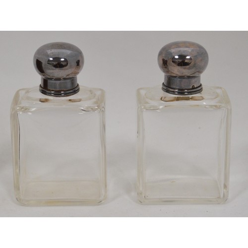 59 - Pair of French cut glass spirits bottles with silver mounts, in leather carrying case, 'Hall du Voya... 