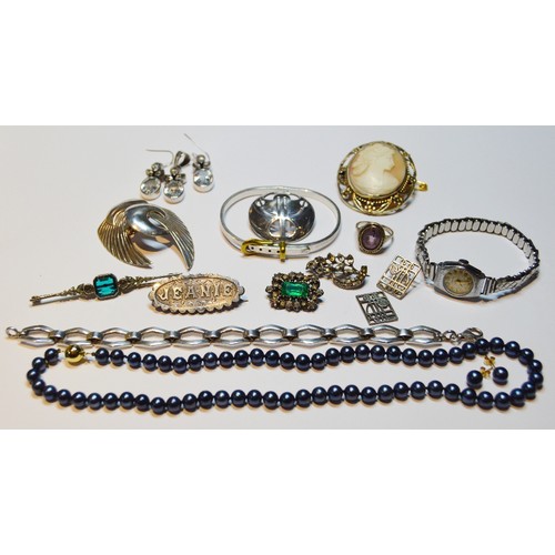 151 - Two early 19th century paste brooches, various silver jewellery and a wristwatch.