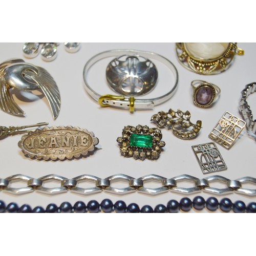 151 - Two early 19th century paste brooches, various silver jewellery and a wristwatch.