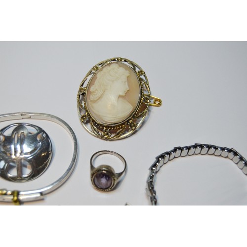 151 - Two early 19th century paste brooches, various silver jewellery and a wristwatch.