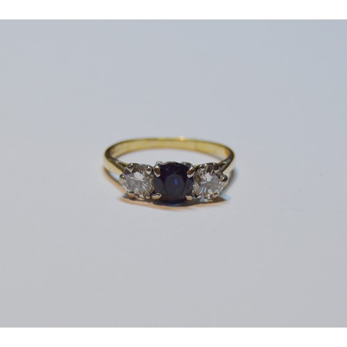 153 - Diamond and sapphire three-stone ring, set with two brilliants, approximately .3ct each, total diamo... 