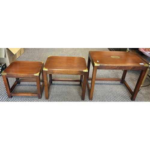 527 - Set of three contemporary nesting tables with brass detail