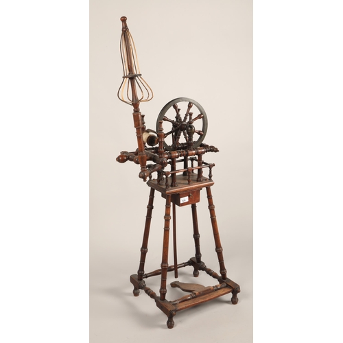 526 - Mahogany spinning wheel, approx 87cm to top of wheel