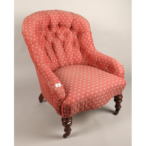 628 - Button back armchair in red floral upholstery