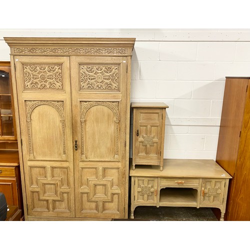 670 - Ornate carved bedroom suite comprising side table with fitted drawers, side unit and large wardrobe ... 