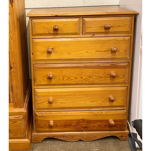 687 - Large pine wardrobe with two over three pine chest of drawers