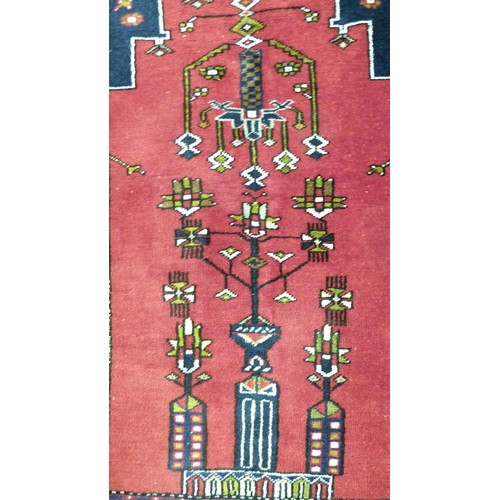 395 - Turkish Belouch rug (Anatolian region), with geometric motifs to the centre on red field, prayer mot... 