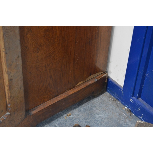 435 - Late Victorian Pugin-style pitch pine wardrobe, the central mirrored pivot door flanked by panelled ... 