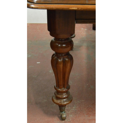 436 - Victorian mahogany dining table with canted corners to the top, two additional leaves, on turned and... 