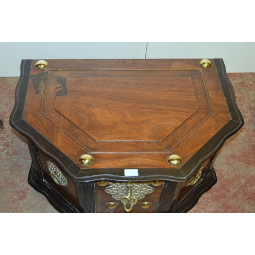 437 - Dutch Colonial teak and ebony chest, c. 19th century, the hinged top with brass studs, serpentine fr... 