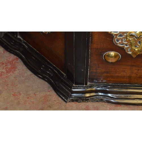 437 - Dutch Colonial teak and ebony chest, c. 19th century, the hinged top with brass studs, serpentine fr... 