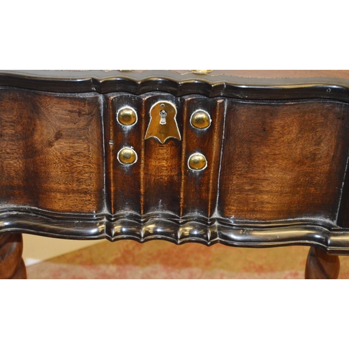 438 - Dutch Colonial teak and ebony work table, the hinged top with brass studs and to the frieze, on barl... 