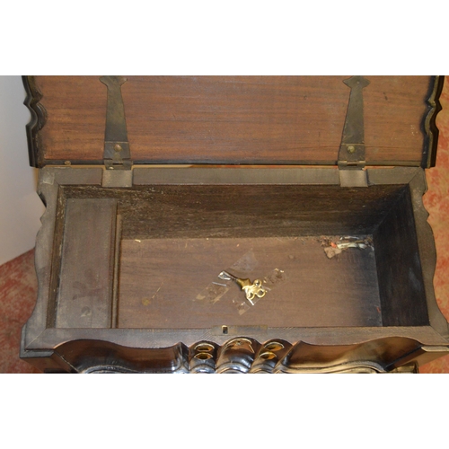 438 - Dutch Colonial teak and ebony work table, the hinged top with brass studs and to the frieze, on barl... 