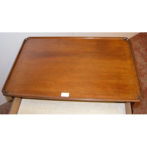 445 - 19th century mahogany silver table, the tray top with canted corners above single drawer below, on c... 