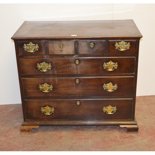 446 - 18th century North European-style walnut chest of four short and three long graduated drawers, iron ... 