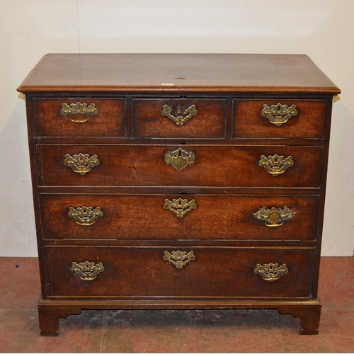 448 - 18th century oak chest of three short and three long drawers, on bracket feet, with later brass hand... 