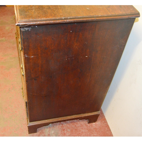 448 - 18th century oak chest of three short and three long drawers, on bracket feet, with later brass hand... 