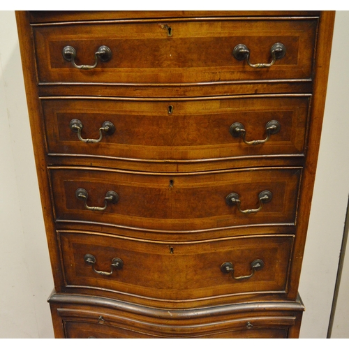 450 - Georgian-style inlaid walnut serpentine chest on chest, the dentil pediment above five graduated dra... 