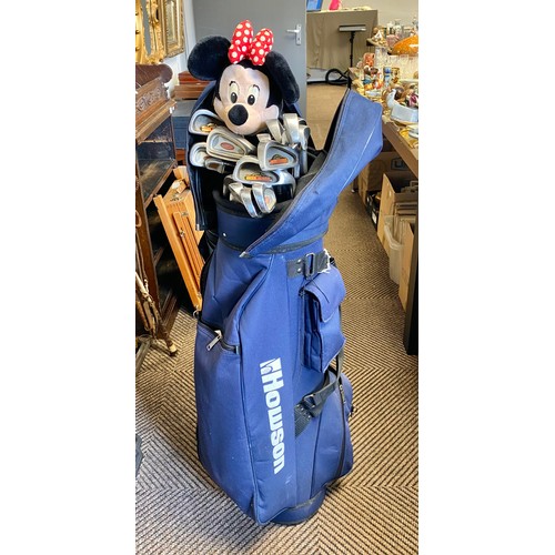 479 - Golf bag containing large variety of golf clubs