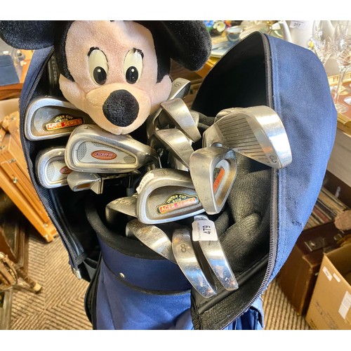 479 - Golf bag containing large variety of golf clubs