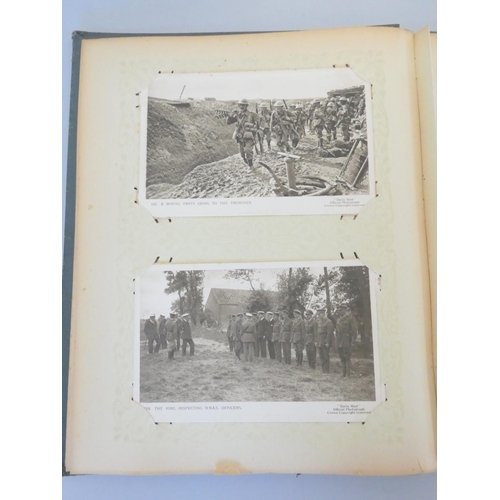 330 - Postcard album containing 52 First World War scenes to include the famous A Present for the Kaiser 