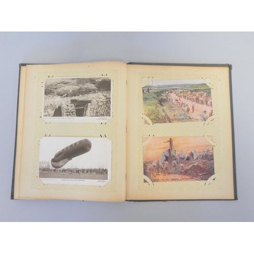 330 - Postcard album containing 52 First World War scenes to include the famous A Present for the Kaiser 